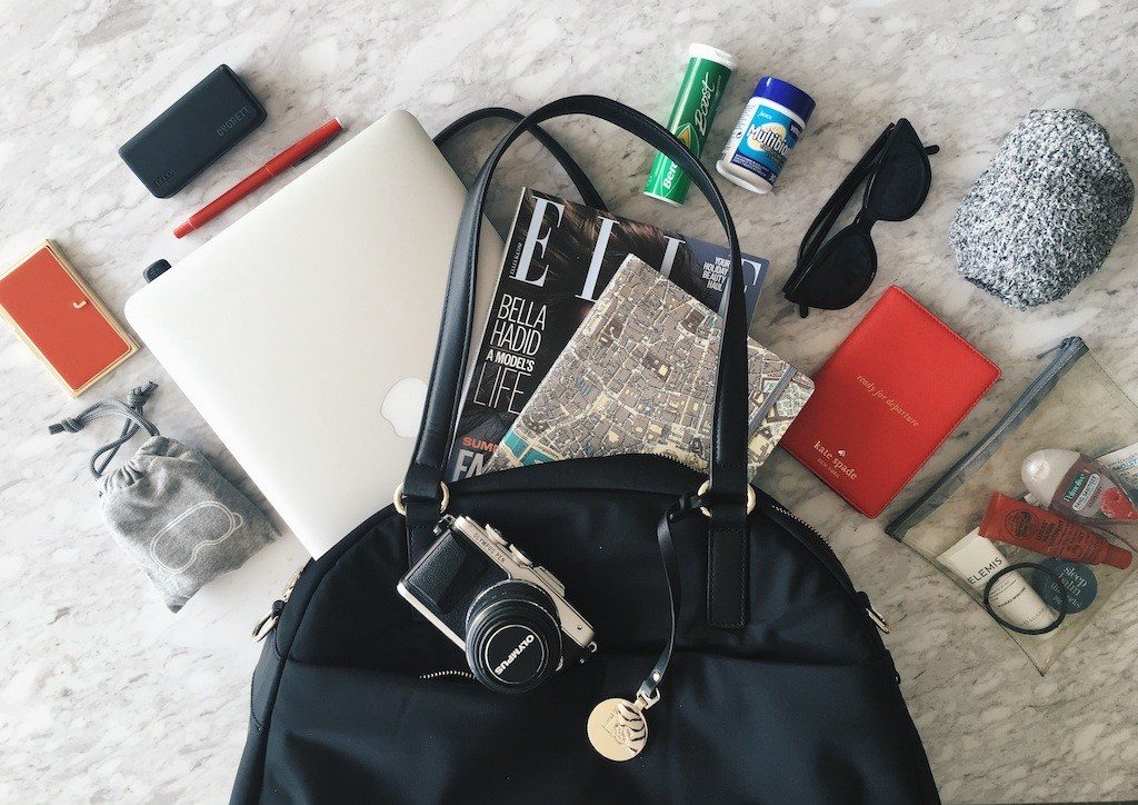 Hand Luggage Essentials For Long-Haul Flights - Girl